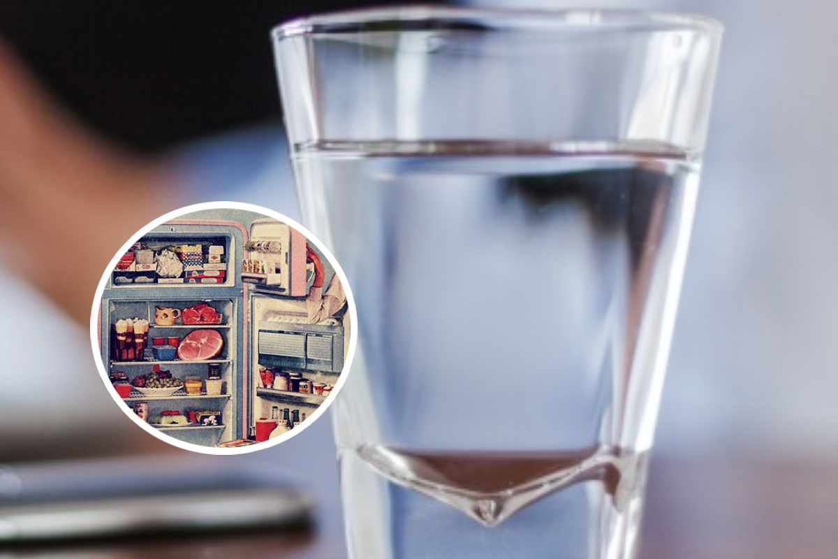 Un bicchiere d'acqua e, in evidenza, un'illustrazione di un vecchio frigo pieno