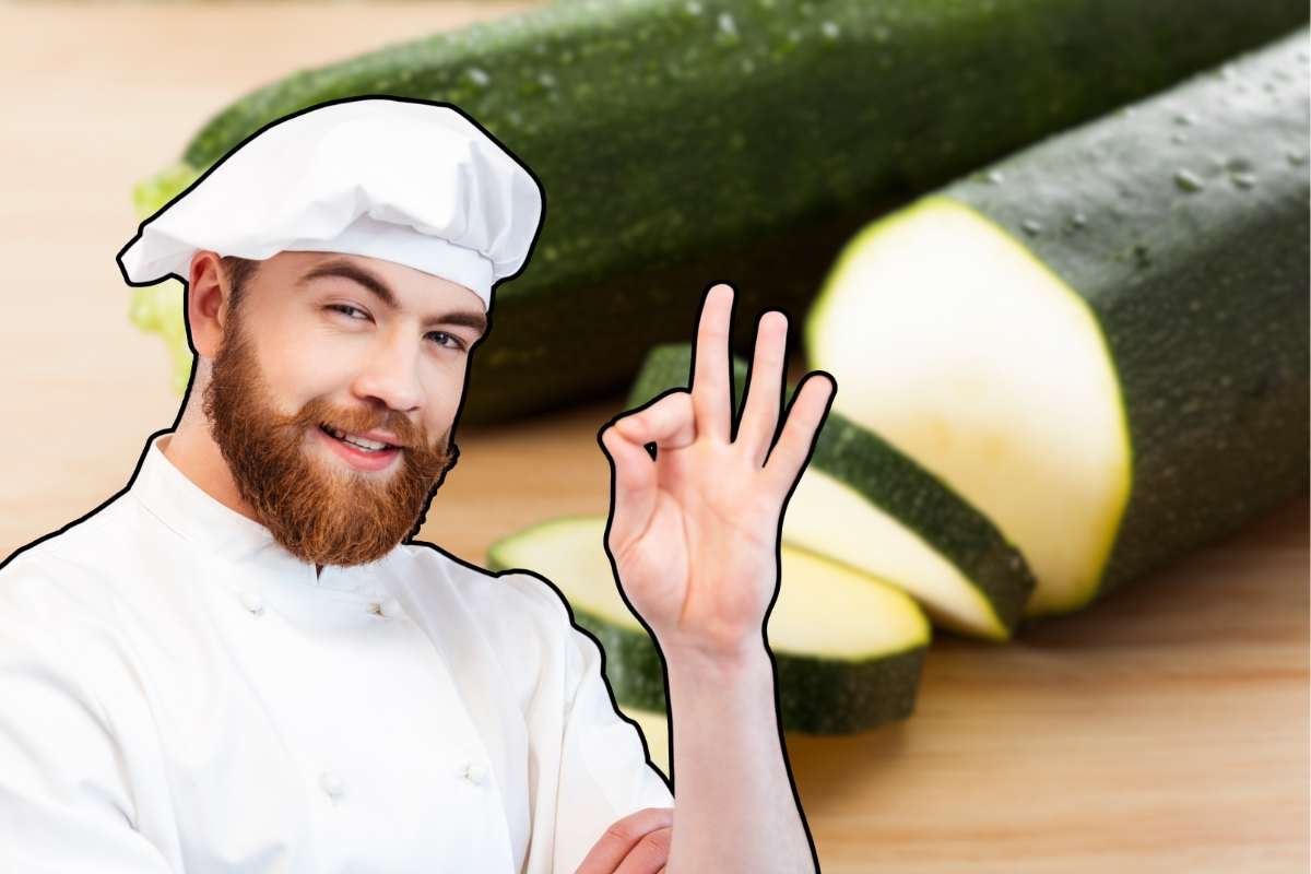 chef in primo piano e zucchine tagliate