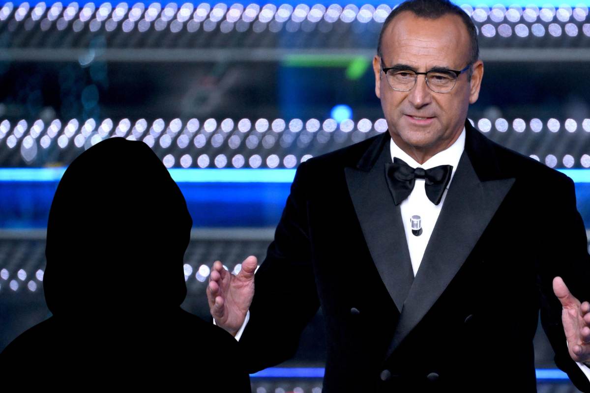 Carlo Conti a Sanremo e sagoma nera
